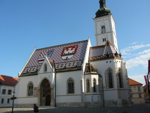 Znaky města a země.